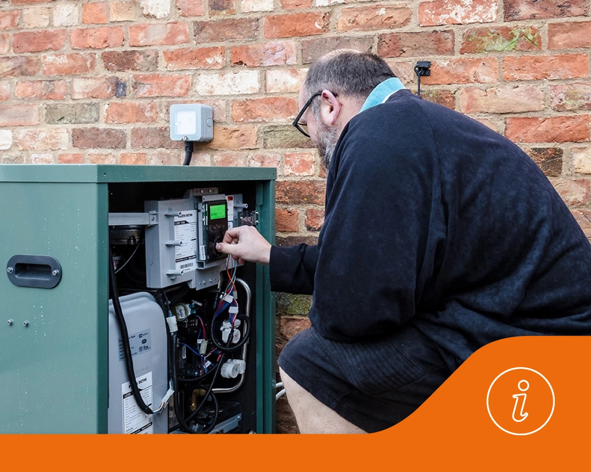 Installer servicing a boiler